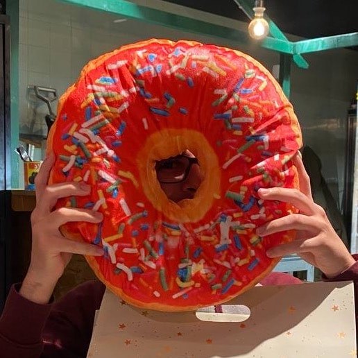 Me, holding a donut